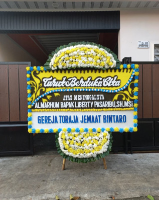 Papan Bunga Duka di Burung Dinang
